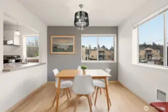 Spacious dining room with breakfast bar pass through into the kitchen.