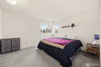 2nd floor primary bedroom has enough room for a king size bed plus plenty of furniture.