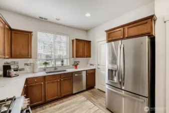 More natural light comes in from the large window above the undermount sink.
