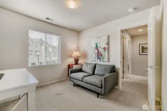 This room is perfect for an in-home office, but easily becomes a 3rd bedroom for guests.