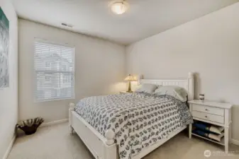 The guest bedroom also is freshly painted and bright & light with newer carpet.