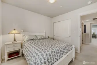 Another view of the guest bedroom with a large closet.