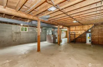 The basement continues with a new furnace and hot water tank, the space is clean and has excellent potential