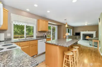 Beautiful granite counter tops and adjoining the family room.