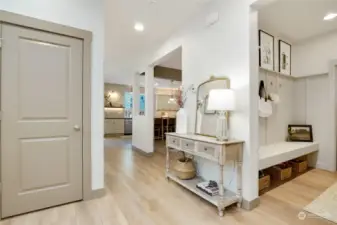 Pretty designer paint, wide plank LVP flooring, newly updated baseboards and door frames