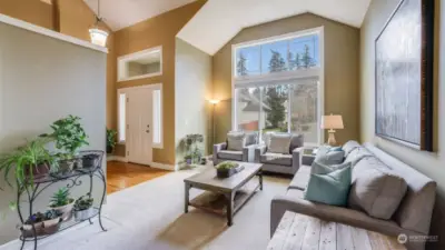 Vaulted 2-story entry leading into the formal living room.