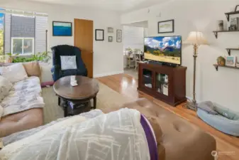 Unit 2220 ~ Bright living room with oak hardwood floors throughout.