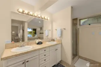 Bathroom of second Primary bedroom suite with jacuzzi bathtub and shower