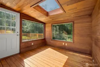Dining room, office, hobby, play room etc... door leads out to large deck.