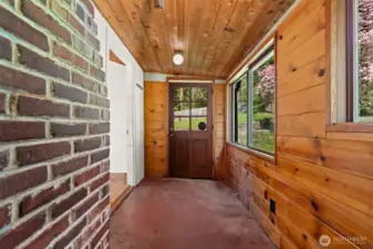 Enclosed porch entryway.