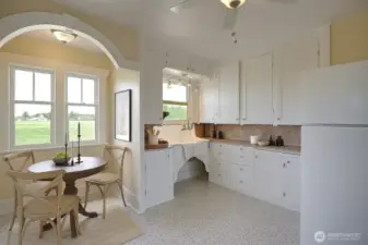 Super cute kitchen with so much charm is virtually staged.