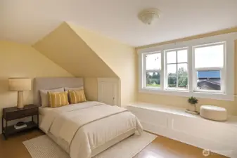 Third bedroom on the upper level has a sweet window seat and is virtually staged.