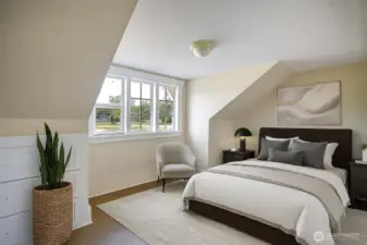 Upstairs bedroom, with built in drawers and walk in closet, is virtually staged.