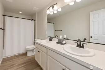 Full upstairs bathroom (Virtually staged)