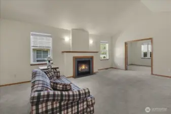 There is a spacious den off of the living room/great room.
