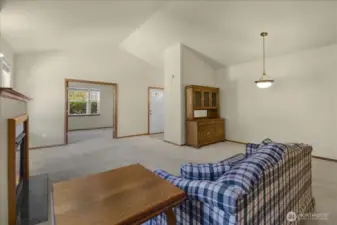 There is a dining room that will accommodate a table and a hutch.