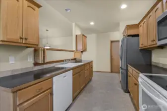 The kitchen has ample counter space and cabinets.  All appliances will remain with the home.