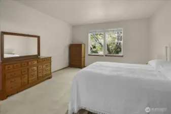 Another view of the primary suite.  It looks out onto the trees and creek.