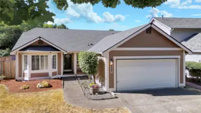Front view of home, freshly landscaped and ready for you!