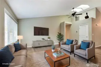 Next to the kitchen you will find your family room, large windows, skylights, cathedral ceilings, beautiful! ***Virtually Staged***