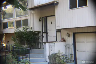 come on in, notice the huge living room windows!!