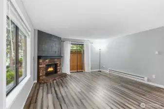 Large windows and a sliding door out to a private deck provide lots of natural light!