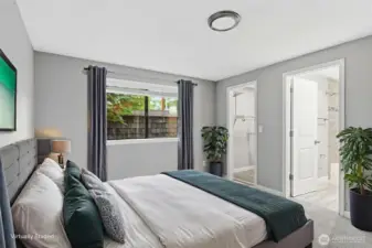 The primary bedroom shown here virtually staged.
