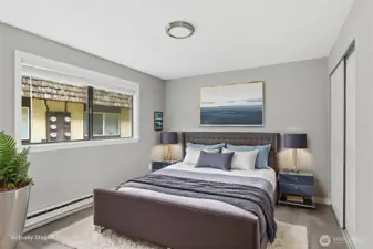 The second bedroom is shown here virtually staged.