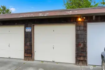 Each garage is fully enclosed with its own garage door.