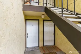 The entry door to this lower level unit.