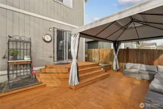 Fully Fenced Backyard with Deck