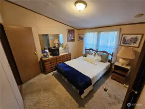 Primary bedroom with en-suite bathroom with a new shower.