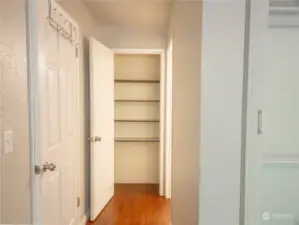 A closer look at the primary bedroom linen closet. Did we mention that this home has LOTS of storage space?