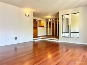 A couple of steps lead to the sunken living room.