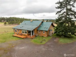 Main house seen from driveway/west side