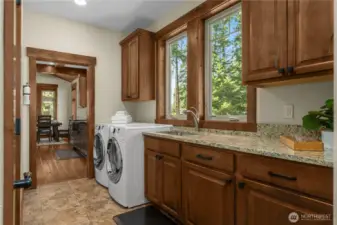 Perfectly placed laundry room with ample storage space.