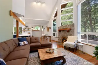 Windows in this home bring in so much natural light and nature.