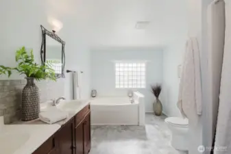 Bright and cheery primary bath with a fresh coat of paint.