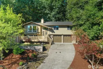 WELCOME! Huge lot, front and back deck and newer roof.