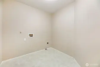 Large upstairs laundry room.