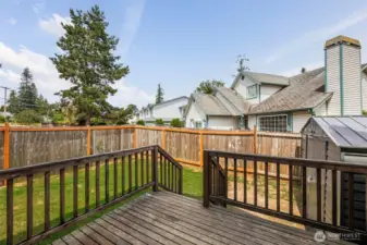 Each unit features a private backyard that's partially fenced.