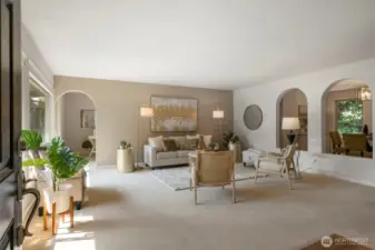 The living room has large windows and easily brings in lots of light!