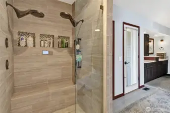 Dual showerheads in primary bathroom.