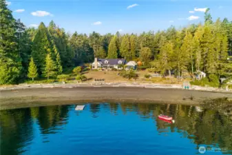330 feet of private soft pebble beach in Rocky Bay. World class crabbing and spotted prawn in this bay. Registered mooring buoy, anchorage in bay suitable for 150 ft yacht, plus plenty of open space to land a helicopter in the expansive front yard.