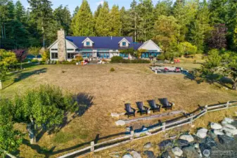 3 acres of beach, forest, lawn, landscaped gardens and a prolific small heirloom fruit tree orchard.