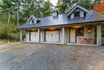 895 SF two car garage with studio guest suite to the right side.