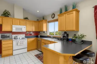 Open kitchen with full pantry.