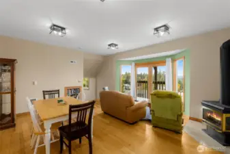 SEPARATE UNIT: Spacious, private entrance unit with full bedroom, bathroom, dining room, living room and kitchen. Tall ceilings and natural light throughout. Notice the furniture is pointed toward the views!