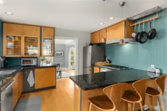 A chef’s delight— with sleek granite, stainless steel, and a layout that flows for entertaining