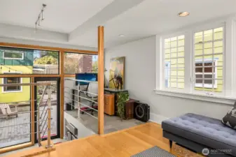 exposed beams & metal rails add to the open layout & speak to the craftsmanship behind every detail